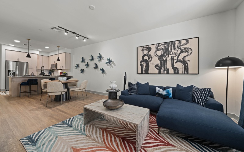 a living room with a couch and a table