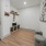 A room with  wall decor, storgae space, entryway