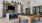 Interior clubhouse room with lounge seating, wall mounted tv, high ceiling, Barstool chairs, ceiling lighting, pool table, hardwood floors