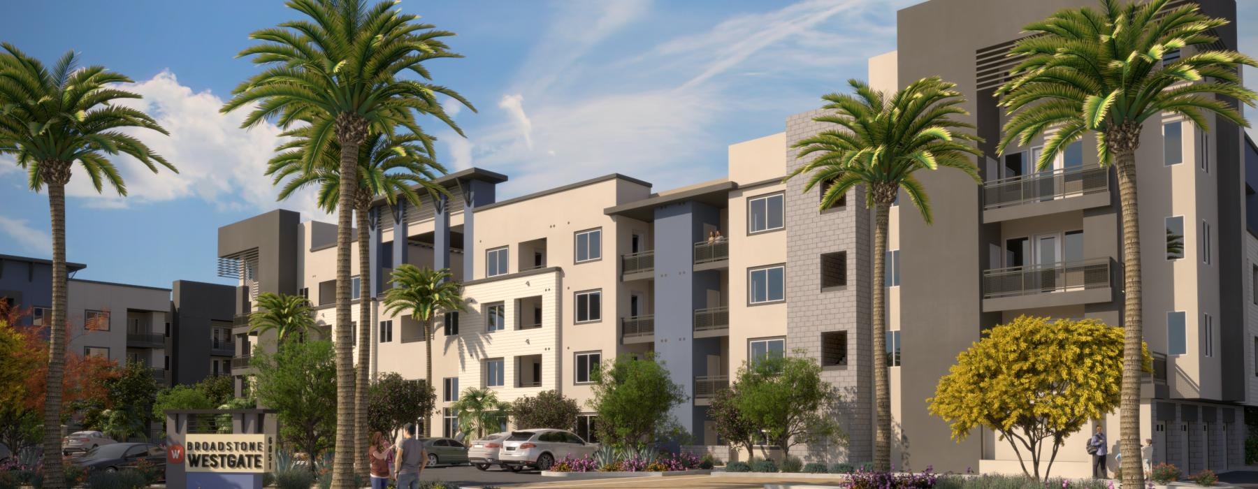 a building with palm trees and people walking on the sidewalk